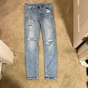 American Eagle ripped blue jeans